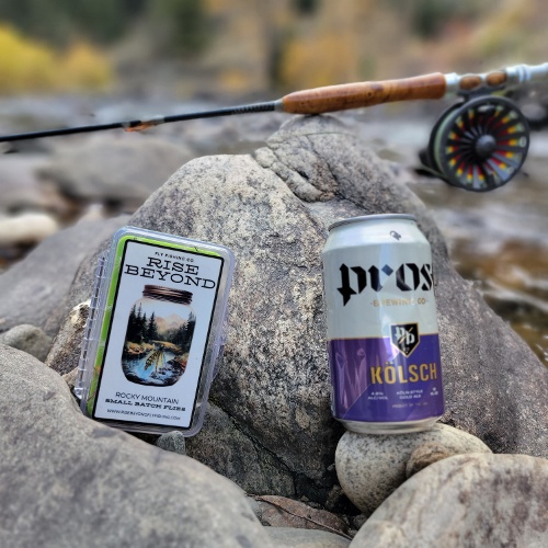 Fly fishing gear with a Griffith’s Gnat beside Bear Creek in Morrison