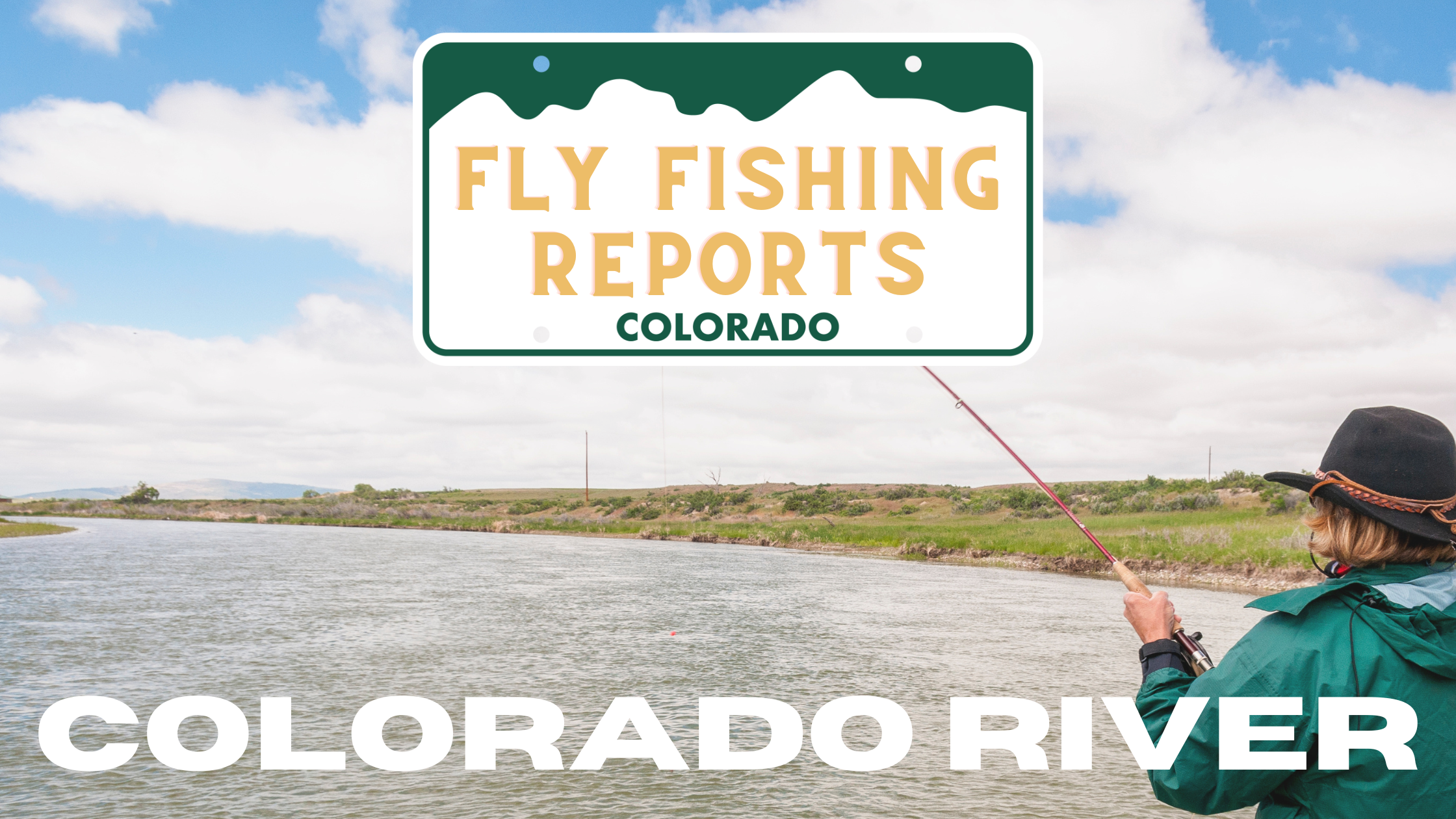 Angler wading in the Colorado River with towering cliffs and lush greenery along the riverbank