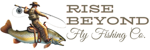 Rise Beyond Fly Fishing Co. logo featuring a cowboy riding a large trout, holding a fishing rod in one hand and a camera in the other, with stylized text in a rugged, outdoor-themed font