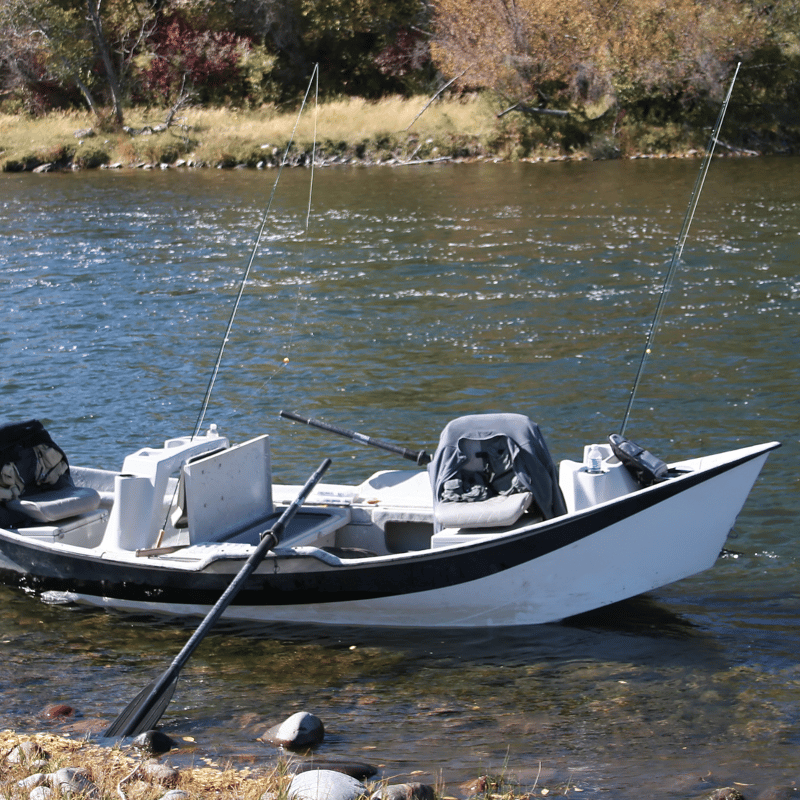 a drift boat anchored to the bank on the colorado river near new caslte colorado fly fishing spots